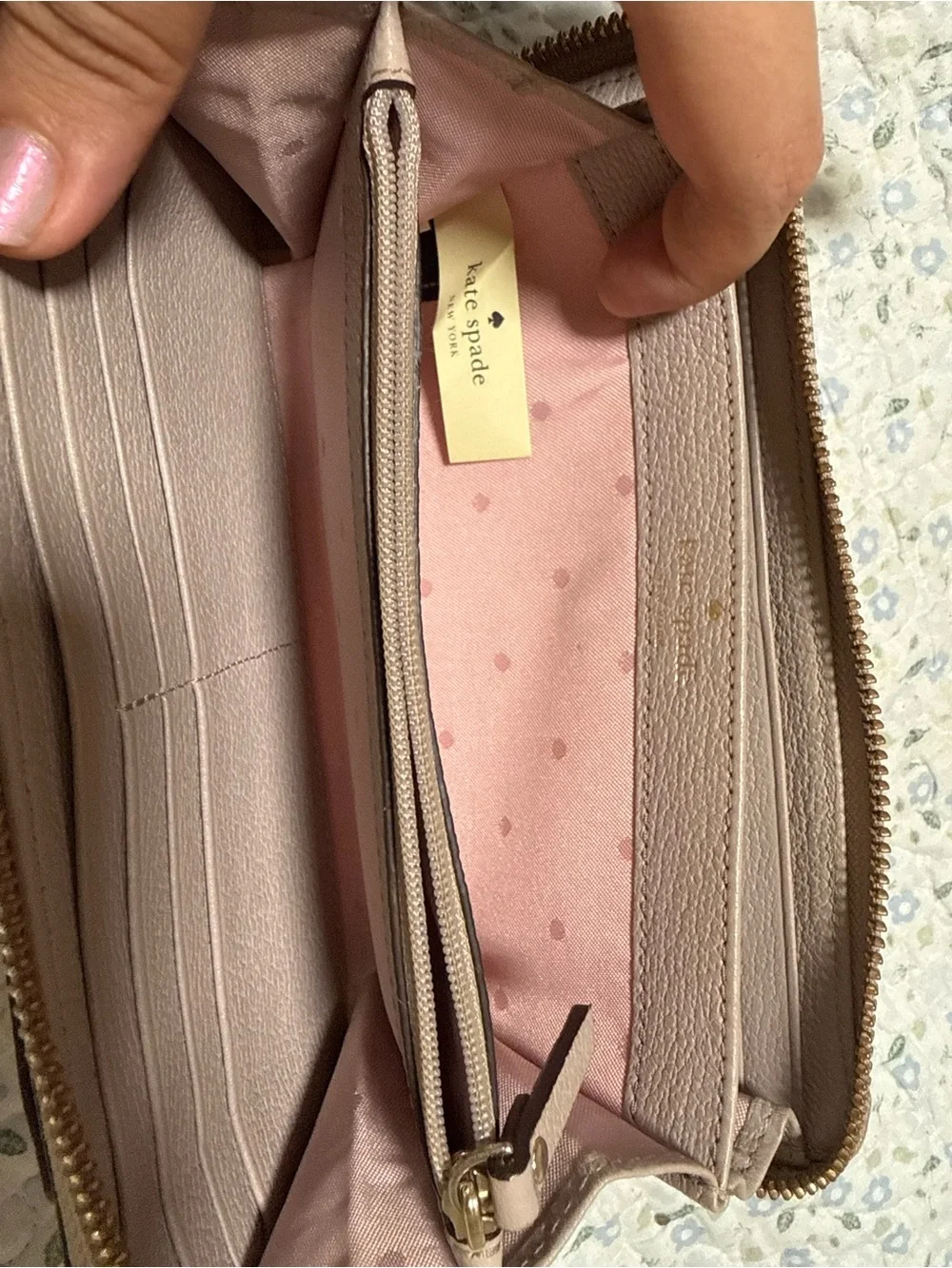 kate spade taupe bow zip-around wallet